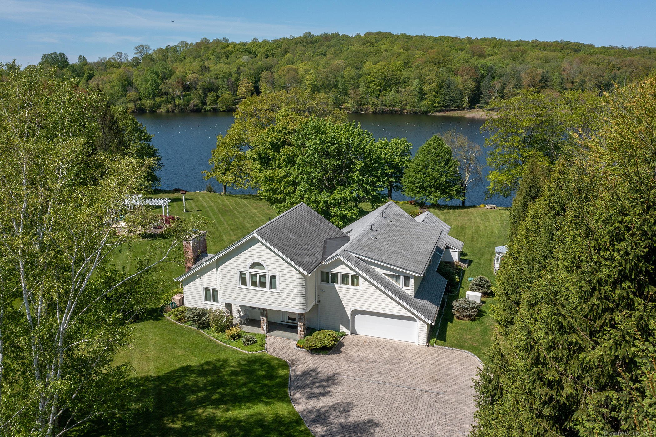 18 Arrow Point Road Warren, CT 06777 - Photo 3 of 30 an aerial view of a house with a garden and a yard