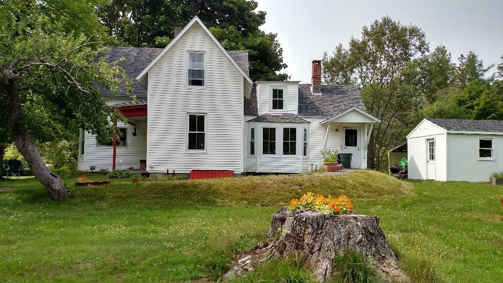 714 Point Road Hancock, ME 04640 - Photo 2 of 33 Side view. Bay of 4 windows is...