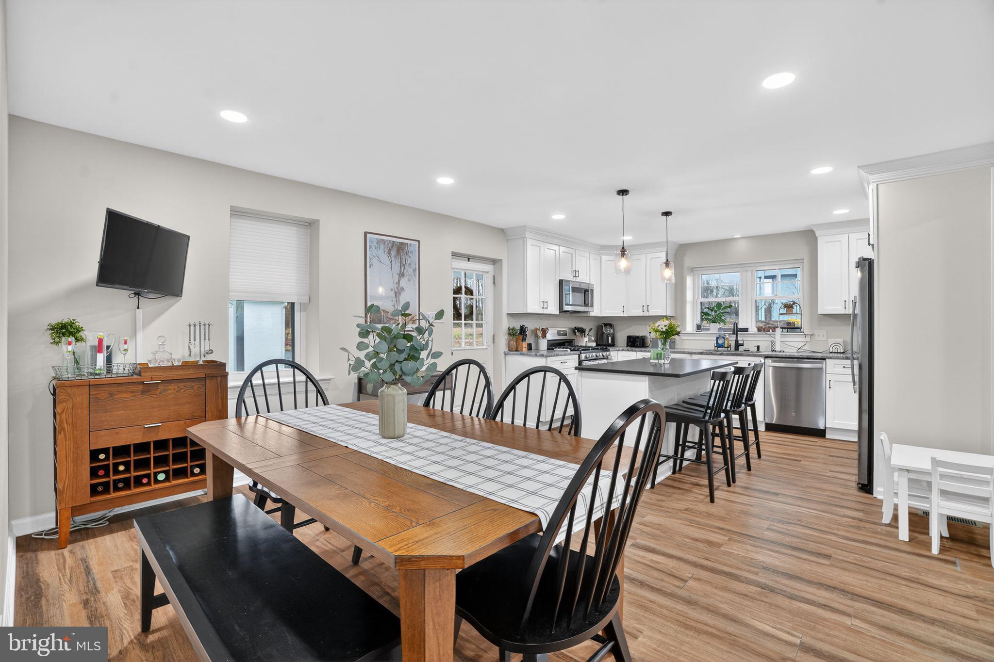 516 Church Road Norristown, PA 19403 - Photo 13 of 31 a dining room with furniture and wooden floor