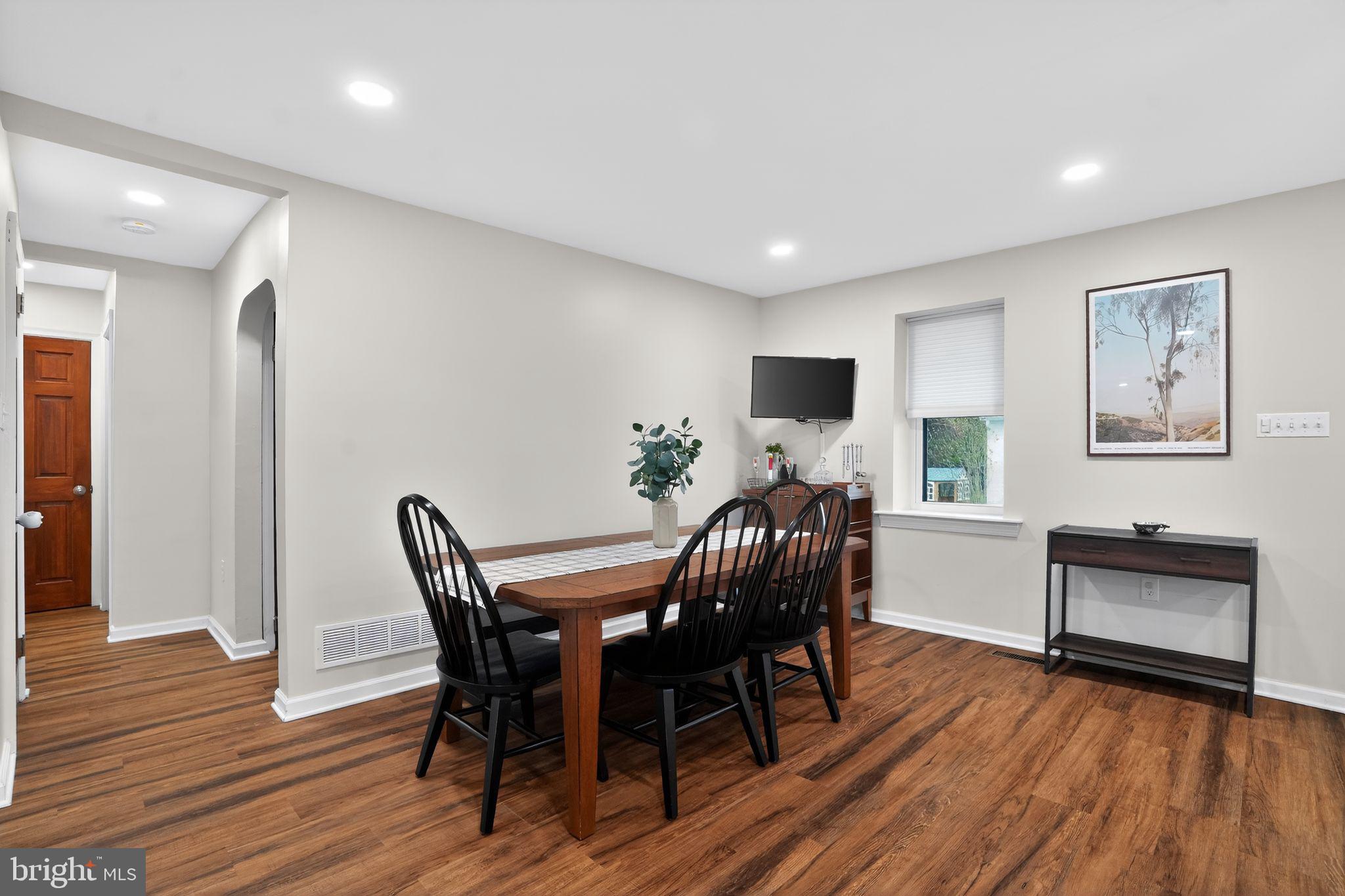 516 Church Road Norristown, PA 19403 - Photo 18 of 31 a view of a dining room with furniture and wooden floor