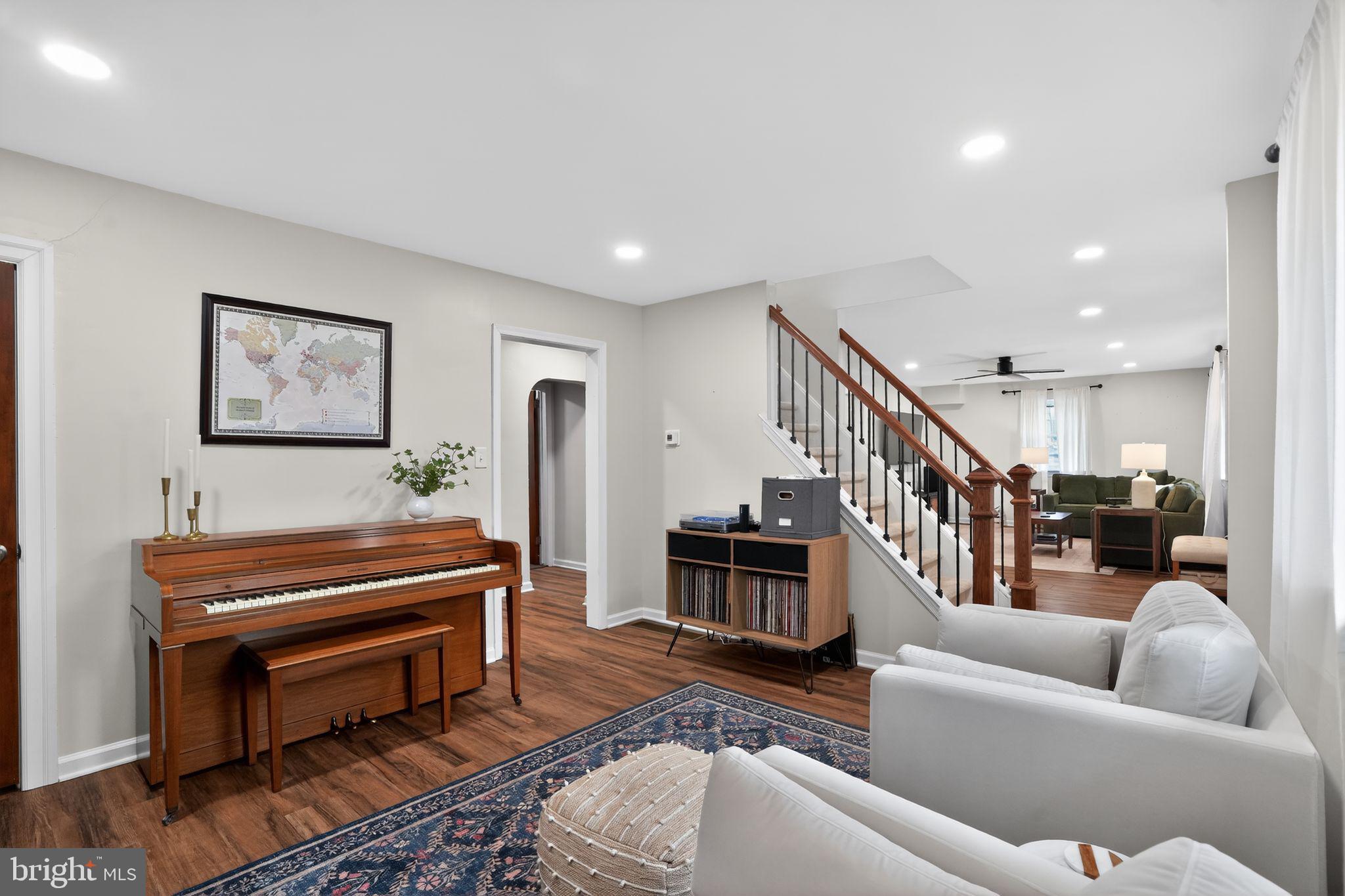 516 Church Road Norristown, PA 19403 - Photo 19 of 31 a living room with furniture and a piano