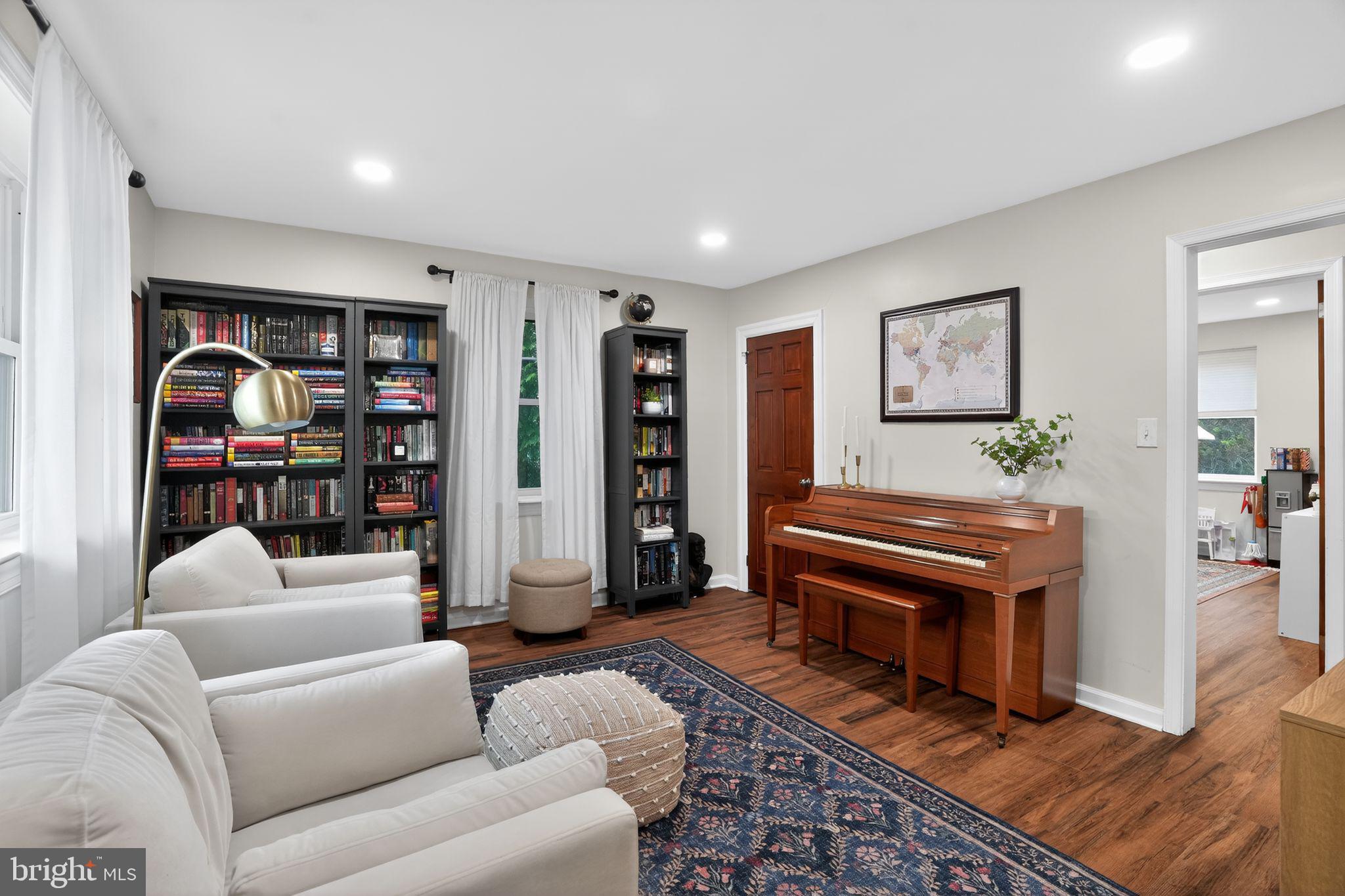 516 Church Road Norristown, PA 19403 - Photo 20 of 31 a living room with furniture and a piano