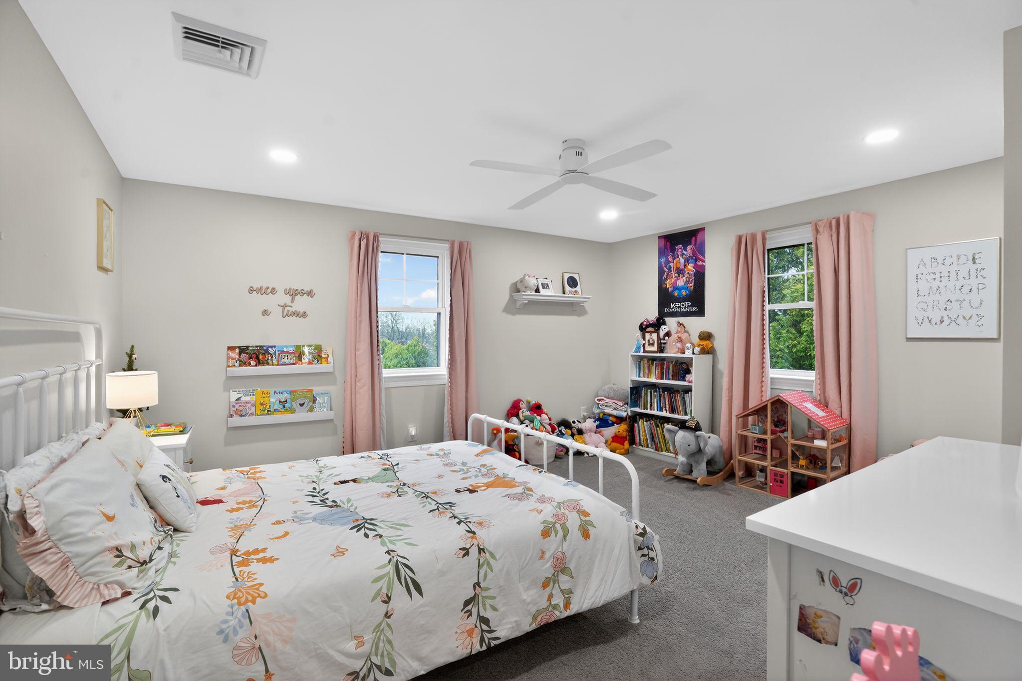 516 Church Road Norristown, PA 19403 - Photo 27 of 31 a bedroom with a large bed and a large window