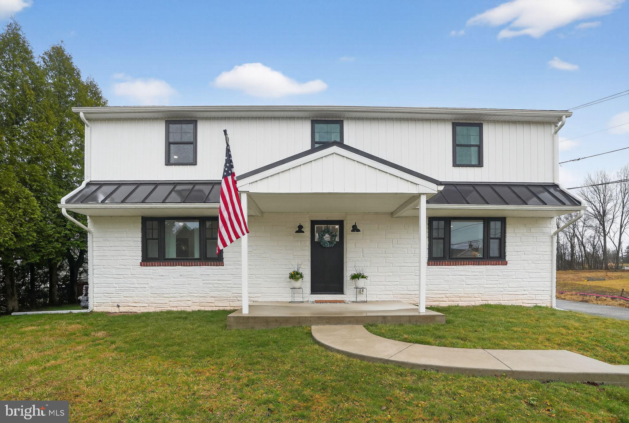 516 Church Road Norristown, PA 19403 - Photo 3 of 31 a front view of a house with a yard