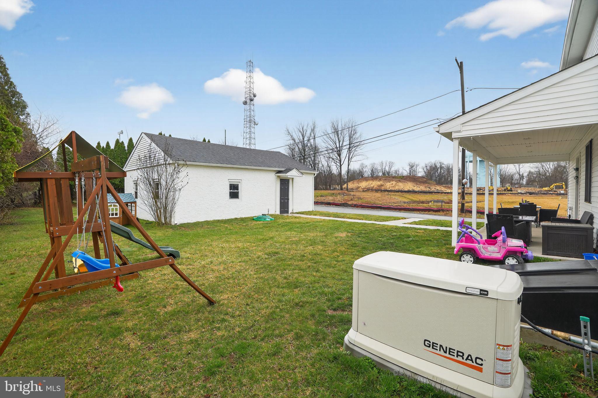 516 Church Road Norristown, PA 19403 - Photo 8 of 31 a living room with furniture and a floor to ceiling window
