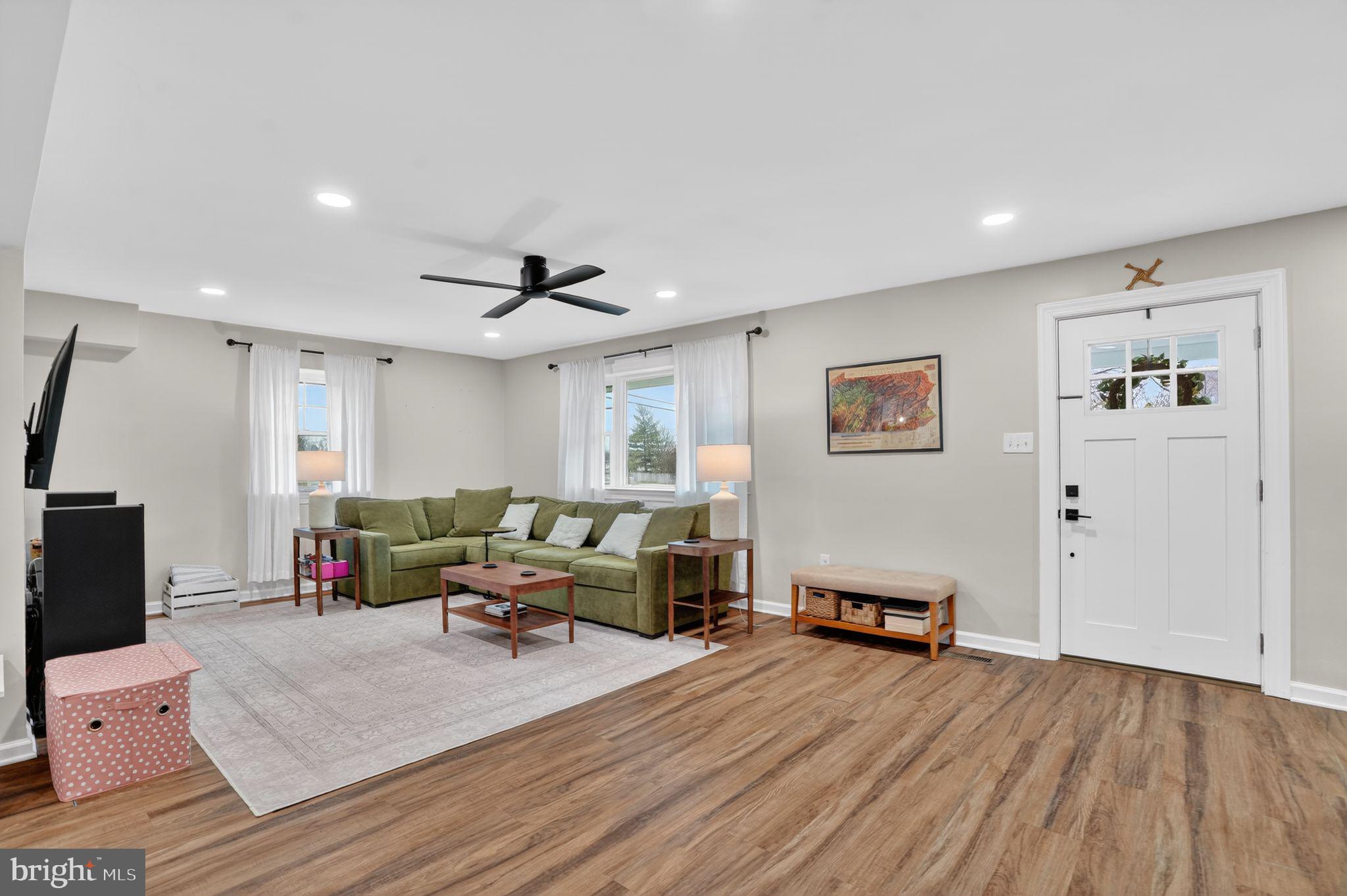 516 Church Road Norristown, PA 19403 - Photo 10 of 31 a living room with furniture and a flat screen tv