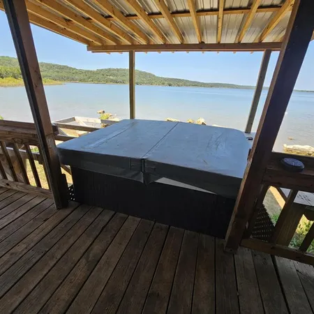 a view of balcony with wooden floor