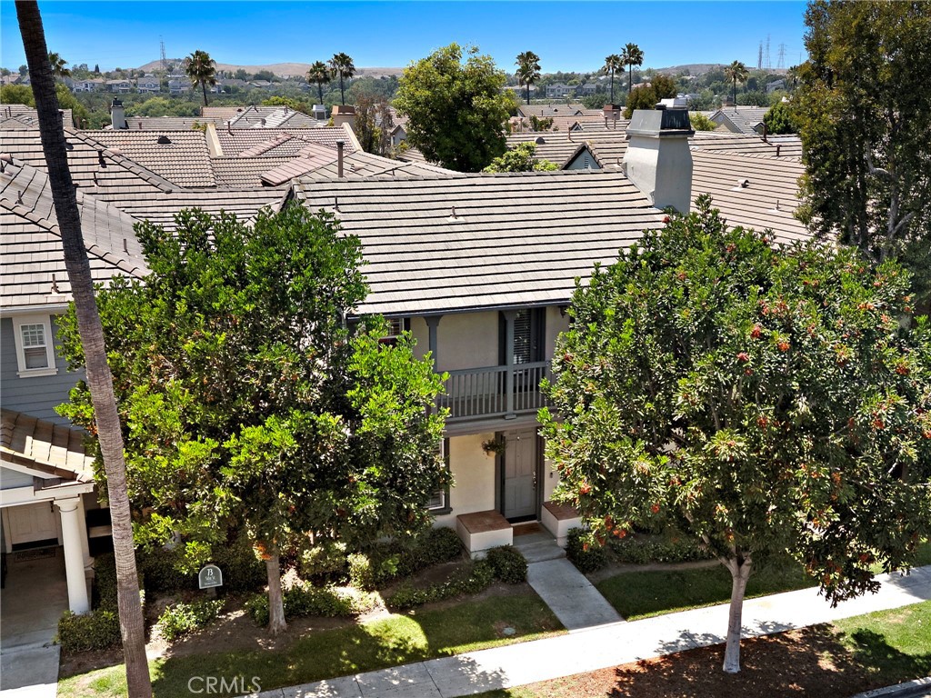 71 Sklar Street Ladera Ranch, CA 92694 - Photo 40 of 55 a view of a patio with table and chairs and potted plants