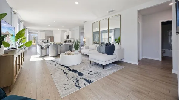 a living room with furniture and a couch
