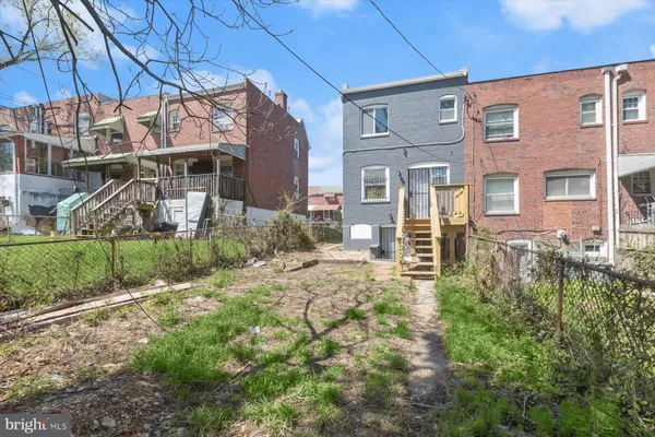 a house view with a backyard space