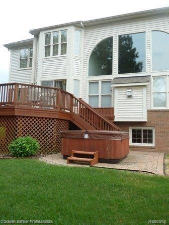 3891 Kaeleaf Road Lake Orion, MI 48360 - Photo 25 of 27 View of Back with Hot Tub.JPG