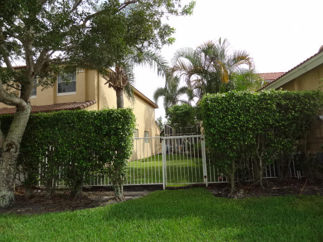 11050 Harbour Springs Circle Boca Raton, FL 33428 - Photo 5 of 20 GATE ENTRANCE TO LARGE SIDEYARD