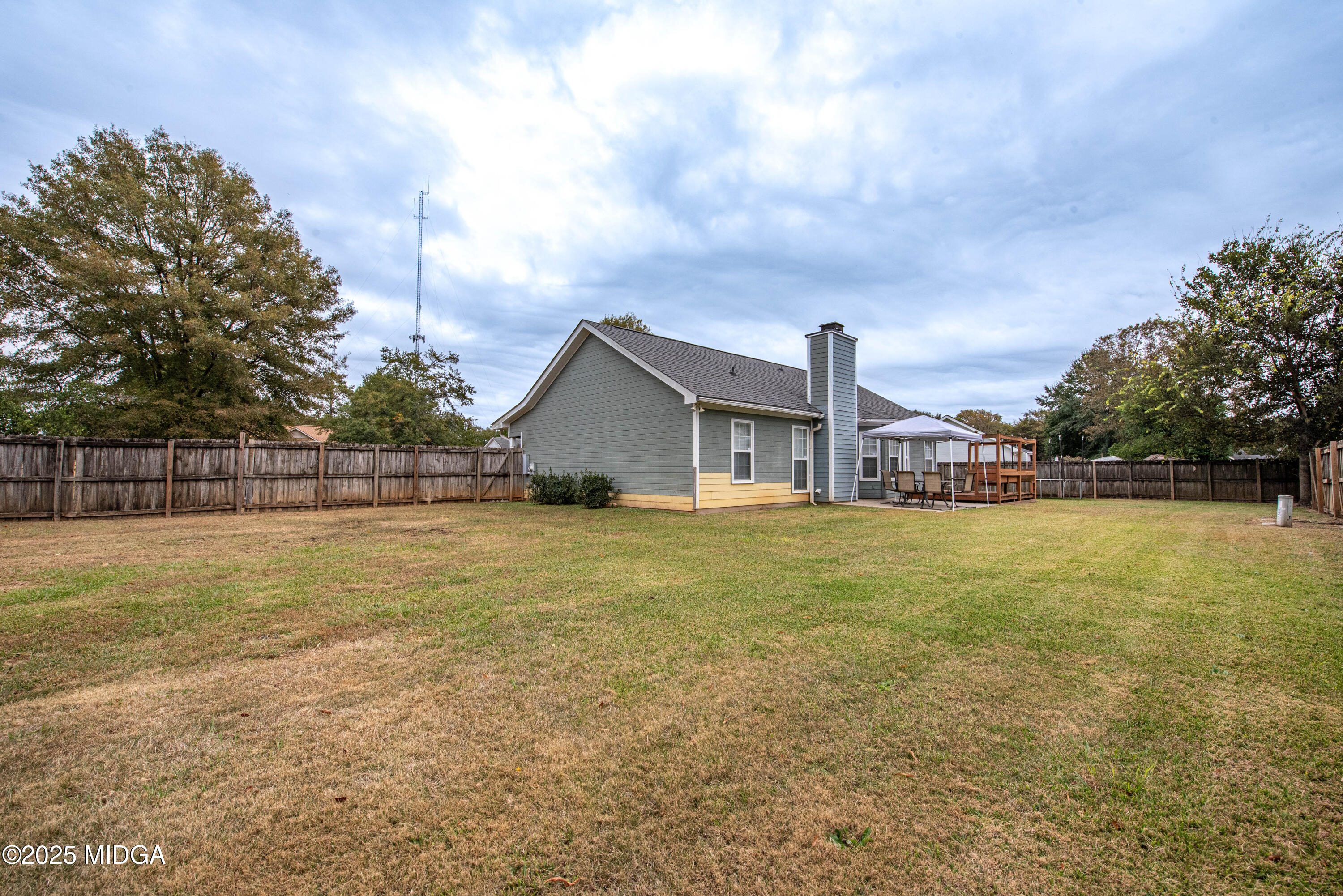 111 Oak Ridge Drive Warner Robins, GA 31093 - Photo 24 of 25 a front view of house with yard and lake