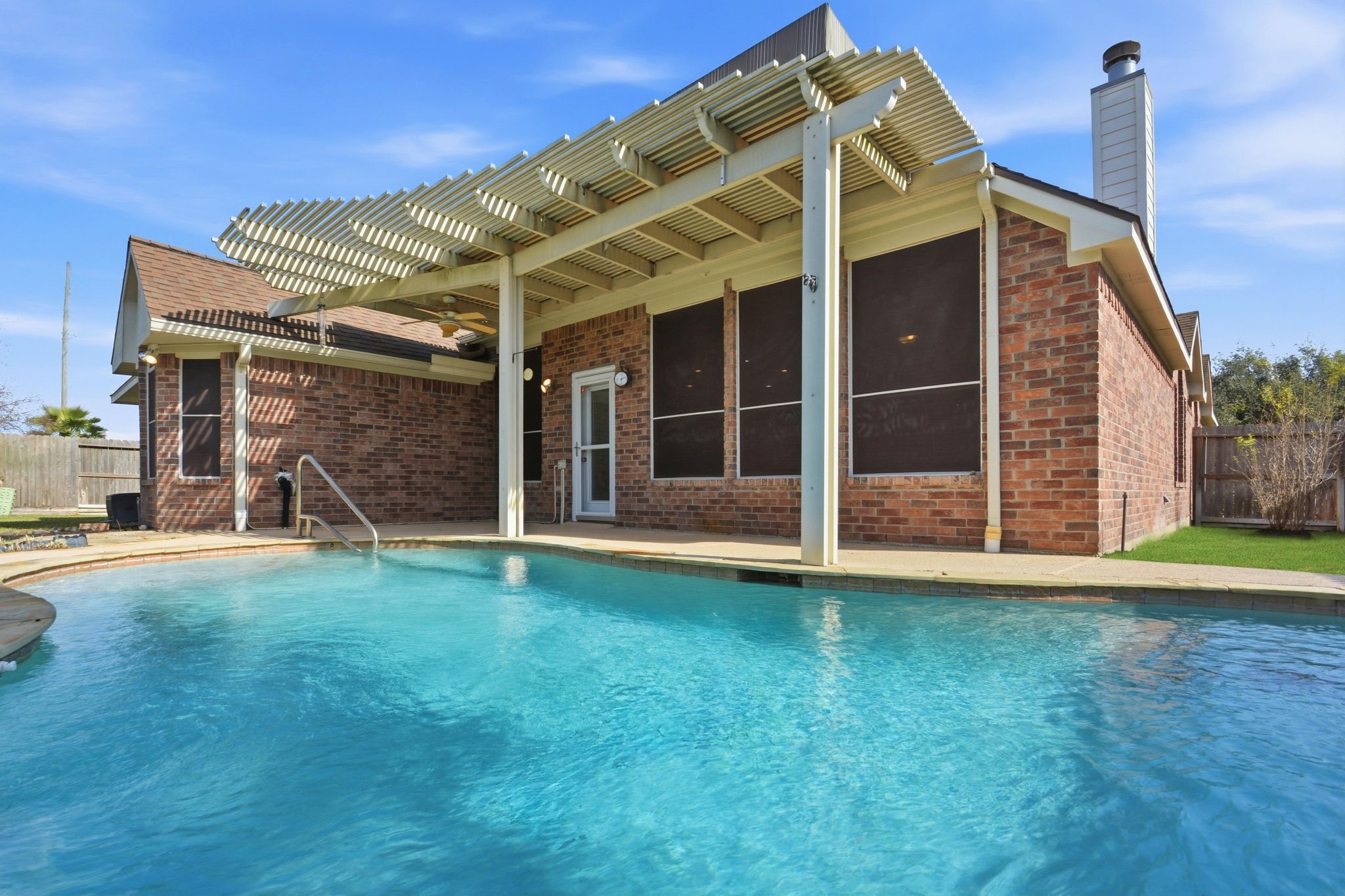 18915 Rustling Ridge Drive Tomball, TX 77377 - Photo 23 of 27 a view of a house with backyard and porch
