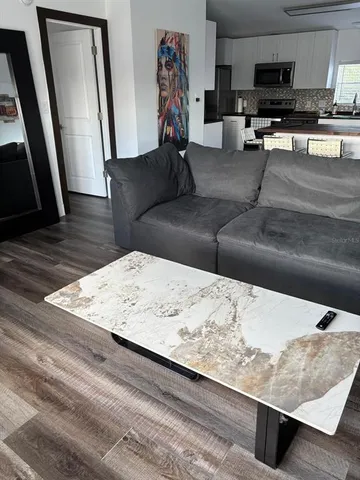 a living room with furniture and a couch