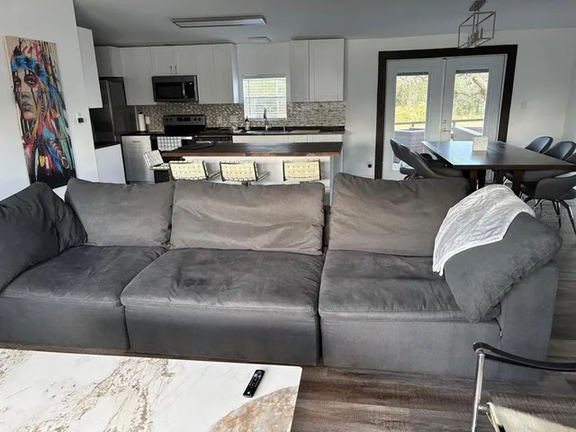 a front view of a house with wooden floor