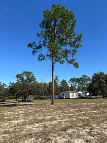 a view of a terrace with chairs