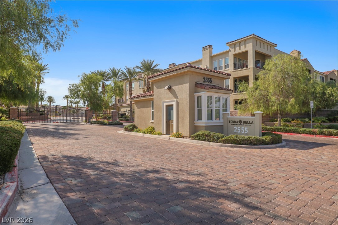 2555 Hampton Road, Unit 2208 Henderson, NV 89052 - Photo 32 of 45 Gated entryway into Terra Bella. This charming community entrance offers a secure, welcoming arrival with its elegant design.