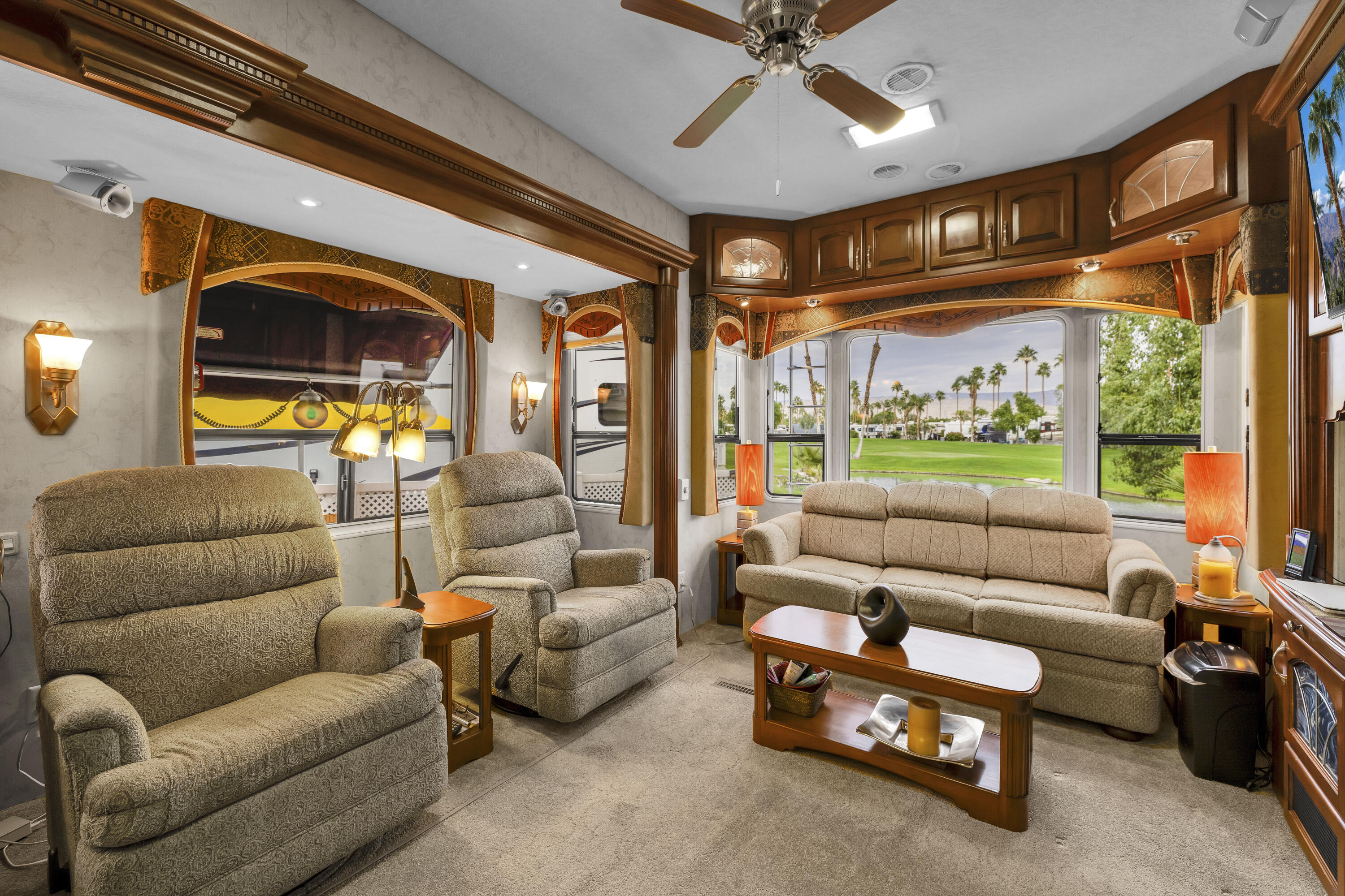 69411 Ramon Road, Unit 1203 Cathedral City, CA 92234 - Photo 12 of 74 a living room with furniture and a large window