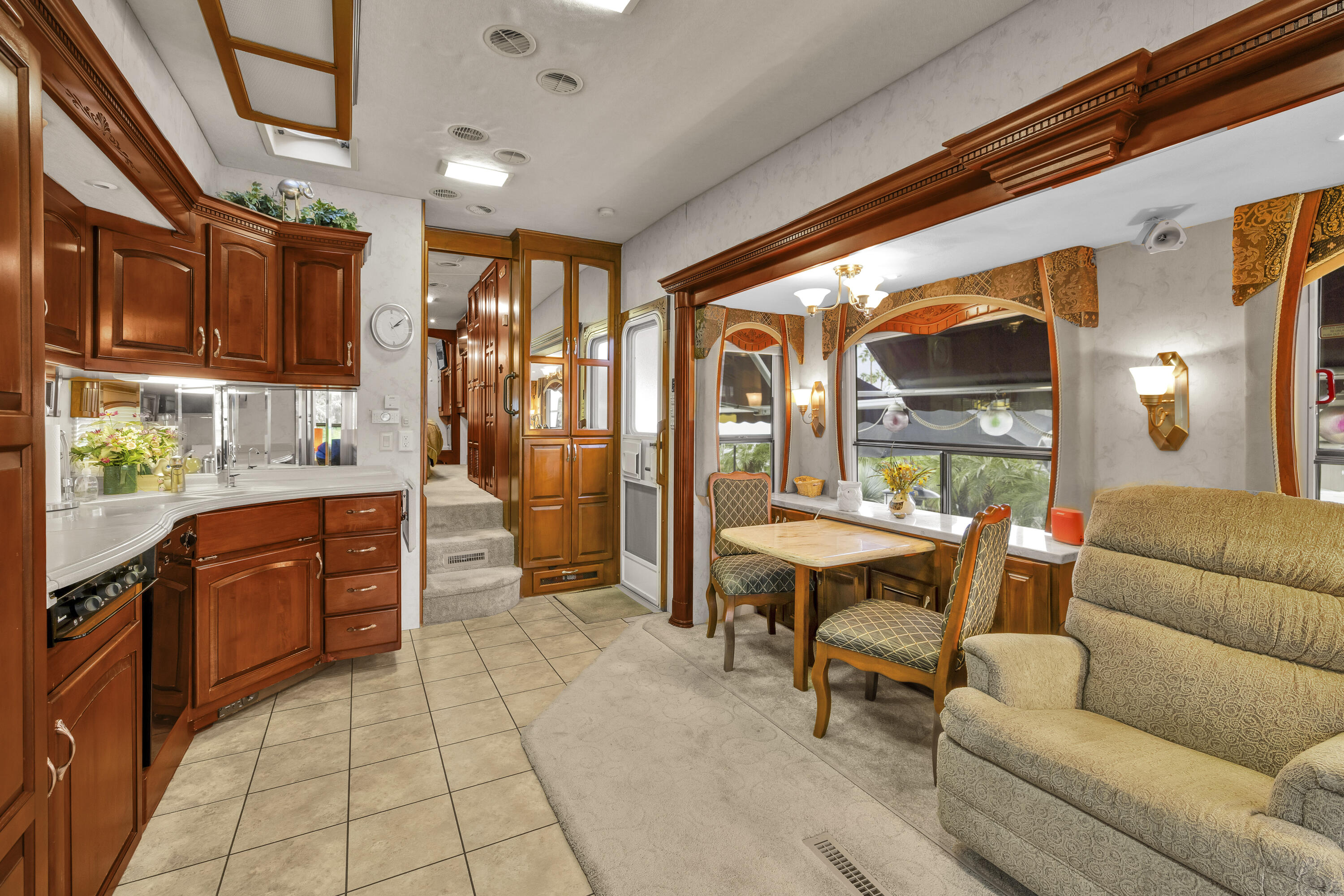 69411 Ramon Road, Unit 1203 Cathedral City, CA 92234 - Photo 14 of 74 a living room with stainless steel appliances kitchen island granite countertop furniture and a kitchen view