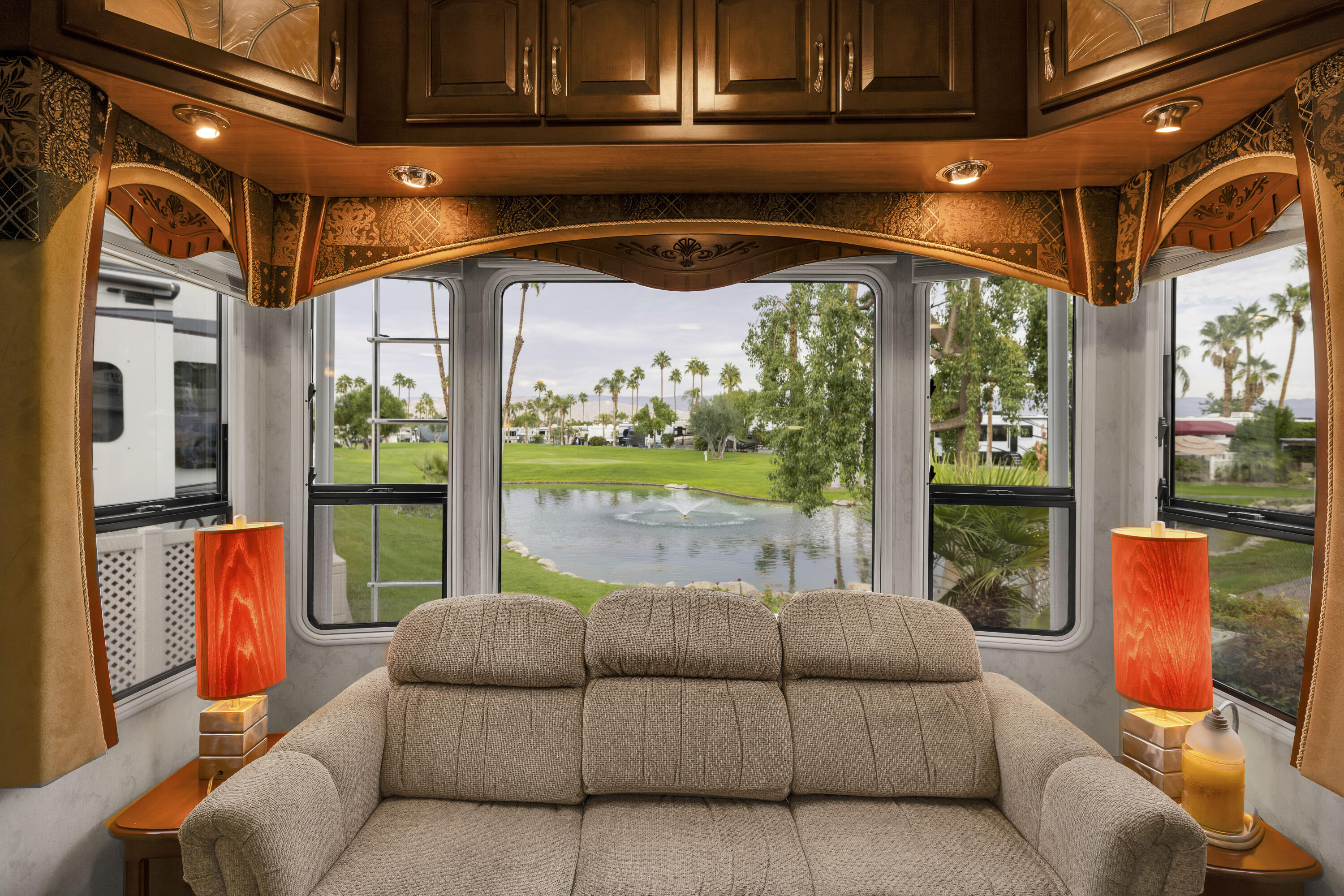 69411 Ramon Road, Unit 1203 Cathedral City, CA 92234 - Photo 16 of 74 a outdoor living space with furniture and garden view