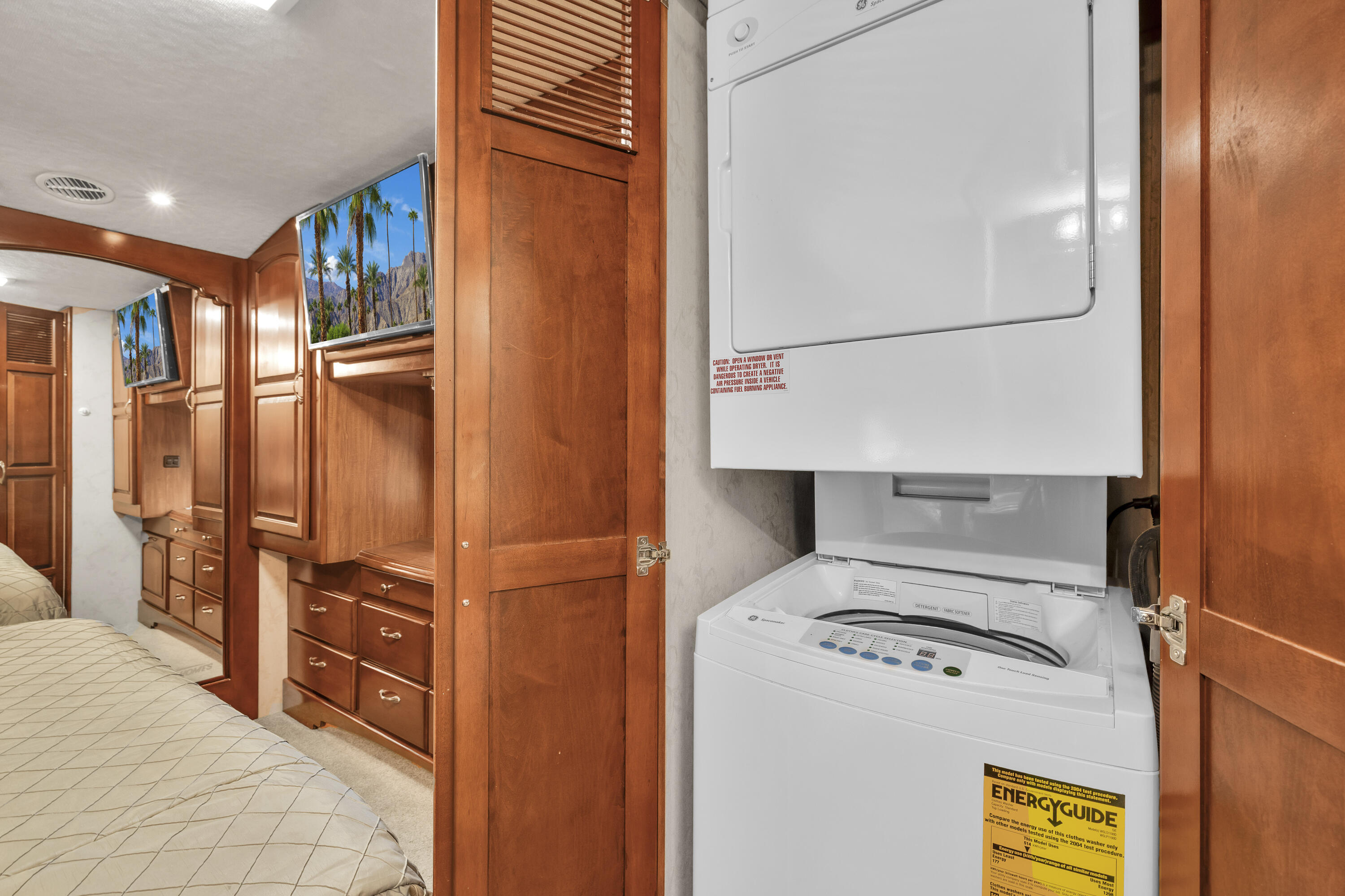 69411 Ramon Road, Unit 1203 Cathedral City, CA 92234 - Photo 20 of 74 a utility room with dryer and washer