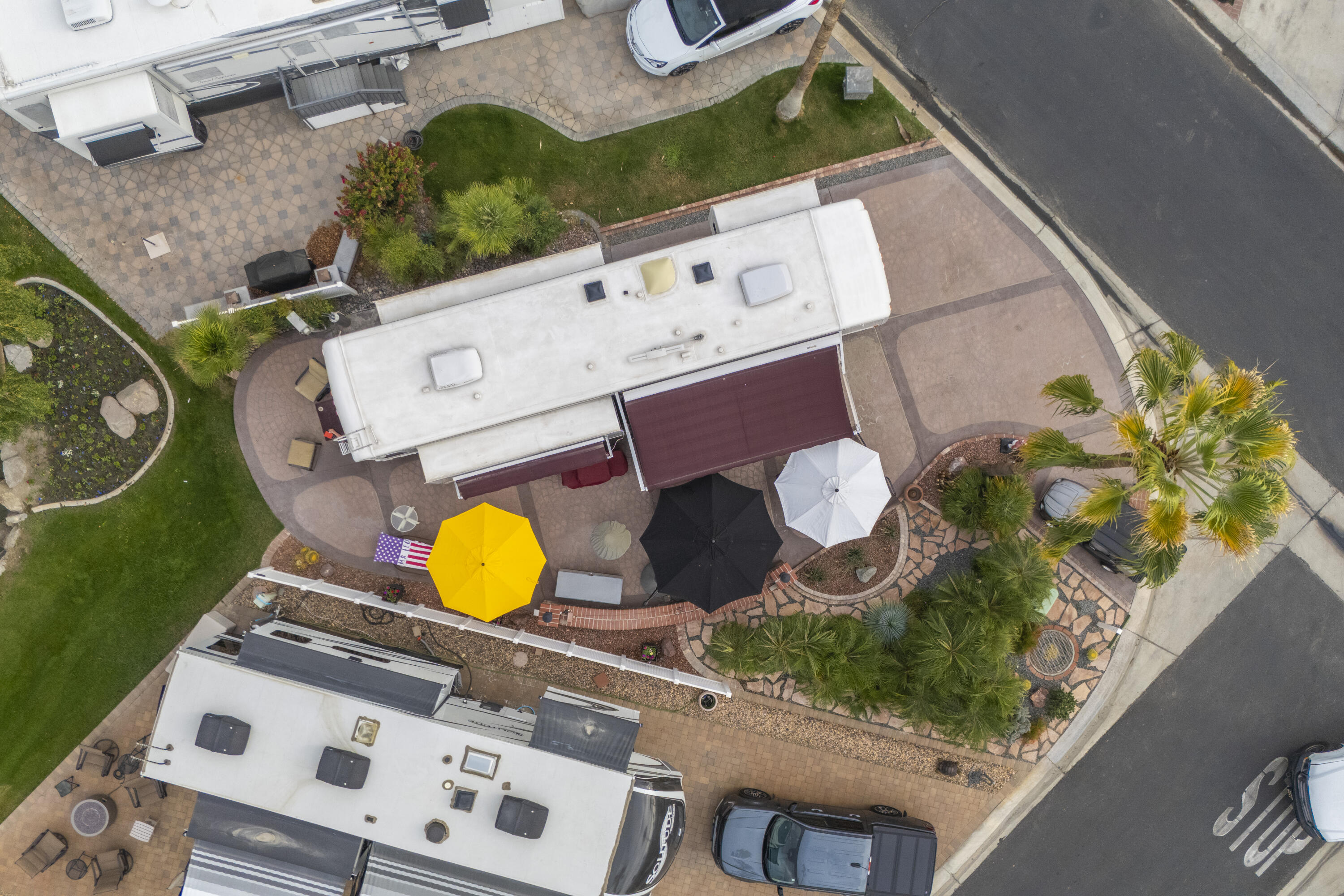 69411 Ramon Road, Unit 1203 Cathedral City, CA 92234 - Photo 9 of 74 an aerial view of a house kitchen swimming pool and outdoor seating