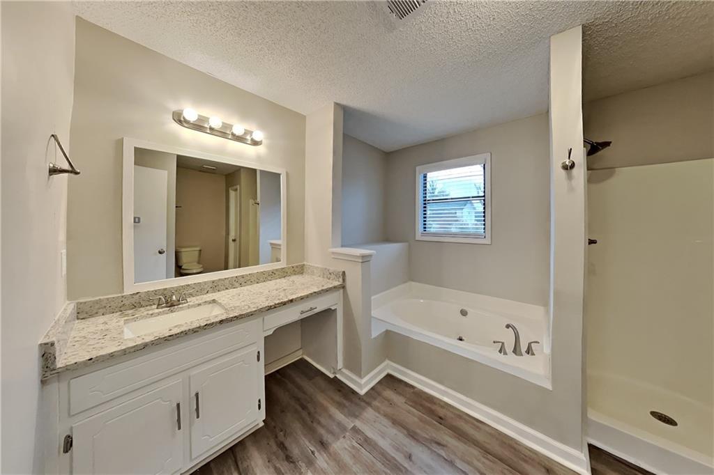 2788 Water Valley Road Austell, GA 30106 - Photo 11 of 20 a bathroom with a bathtub and a sink