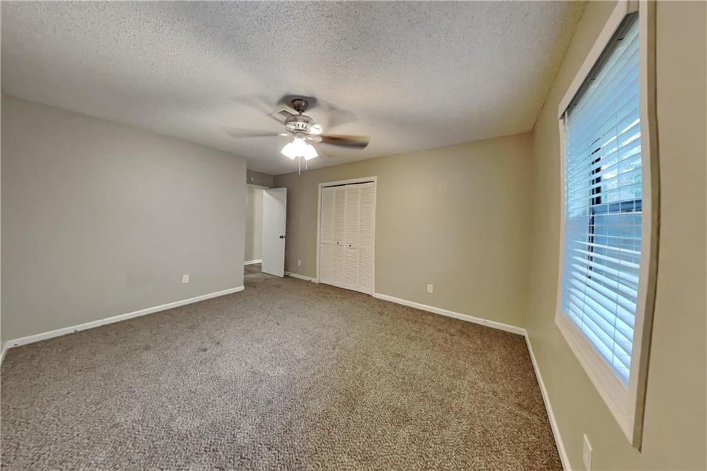 2788 Water Valley Road Austell, GA 30106 - Photo 16 of 20 a view of an empty room with a window