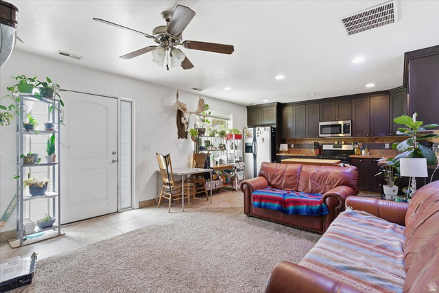 6237 West 4600th Street South Hooper, UT 84315 - Photo 24 of 48 Living area featuring a ceiling fan, recessed lighting, and light tile patterned flooring