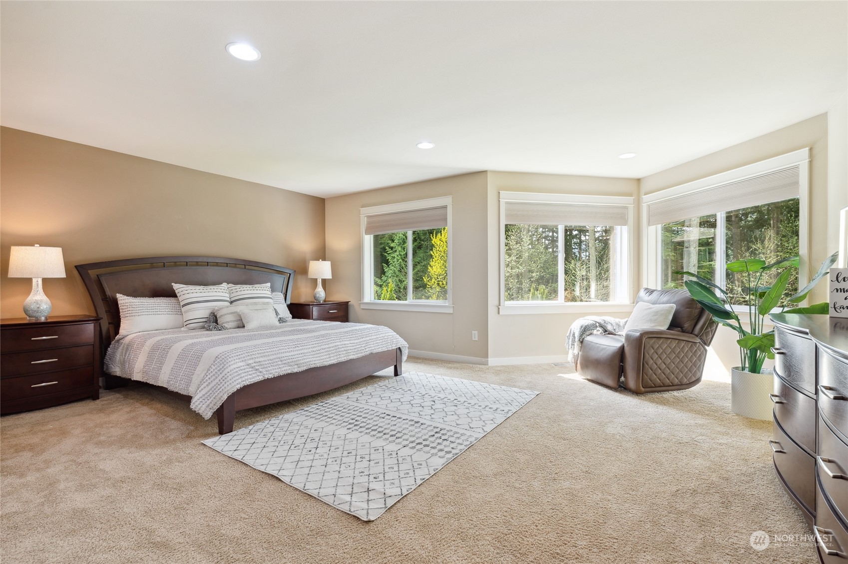 10719 Elliston Way Northeast Redmond, WA 98053 - Photo 17 of 39 a bedroom with a bed and glass window