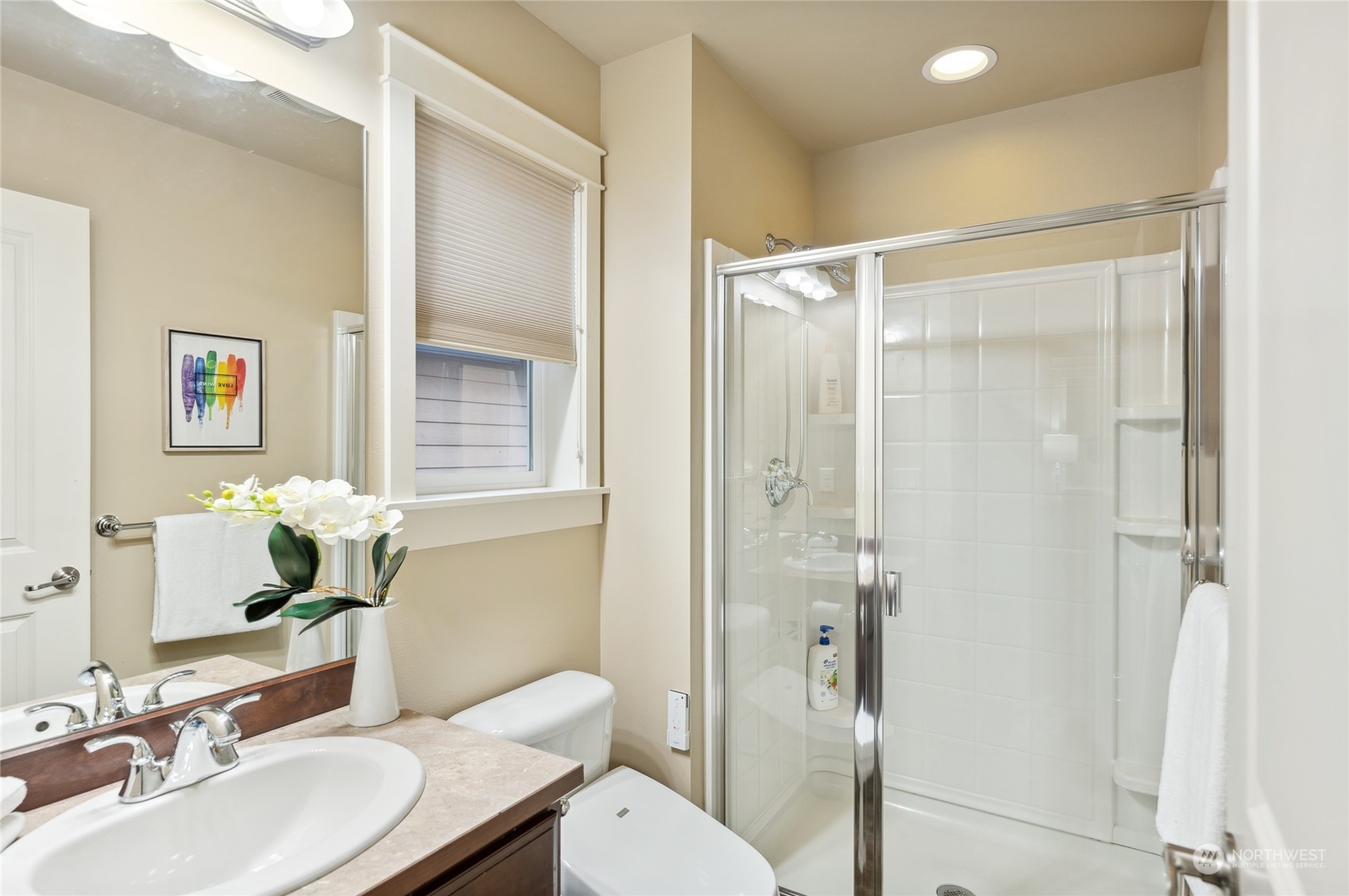 10719 Elliston Way Northeast Redmond, WA 98053 - Photo 22 of 39 a bathroom with a sink toilet and shower