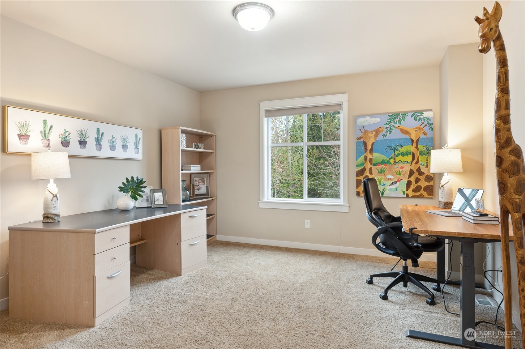 10719 Elliston Way Northeast Redmond, WA 98053 - Photo 25 of 39 a view of a workspace with furniture and a window