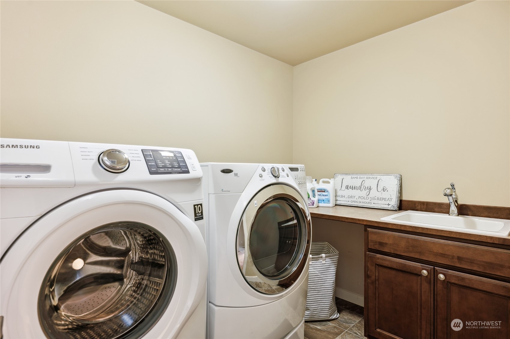 10719 Elliston Way Northeast Redmond, WA 98053 - Photo 28 of 39 a utility room with dryer and washer