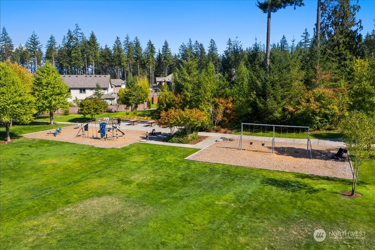 10719 Elliston Way Northeast Redmond, WA 98053 - Photo 35 of 39 a view of a chairs and table in the yard