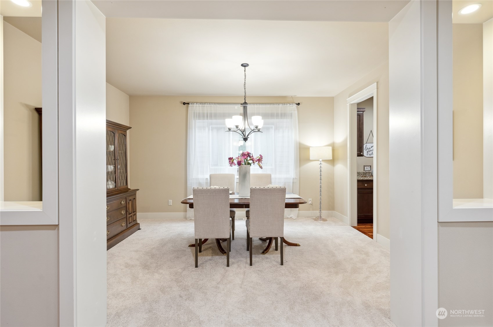 10719 Elliston Way Northeast Redmond, WA 98053 - Photo 6 of 39 a dining room with furniture and window