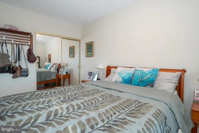 a bed room with a bed and a couch