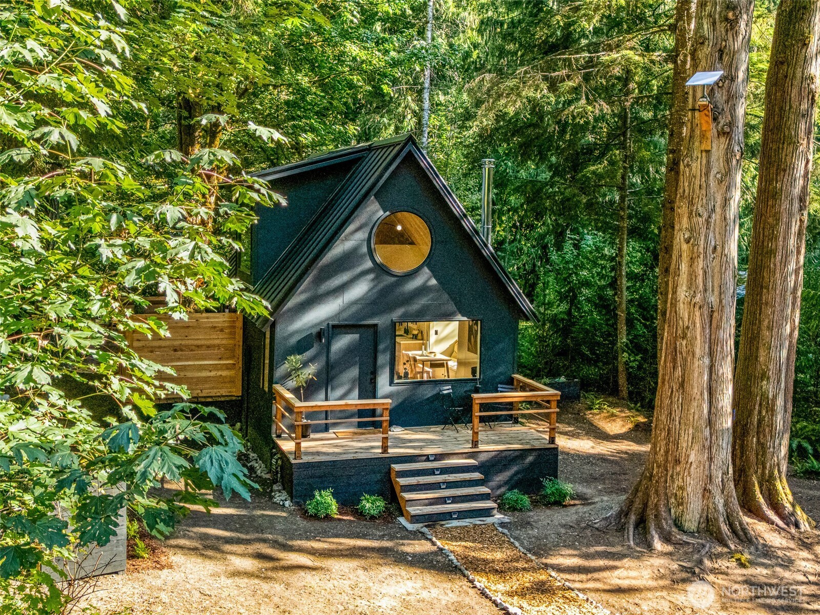 64258 Lookout Mtn Loop Marblemount, WA 98267 - Photo 1 of 40 a front view of a house with garden