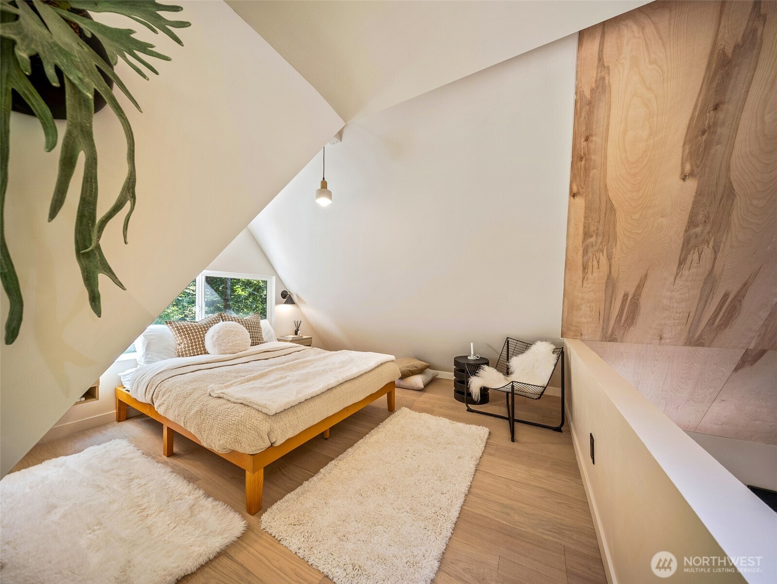 64258 Lookout Mtn Loop Marblemount, WA 98267 - Photo 12 of 40 a bedroom with a bed and a cabinets next to a window