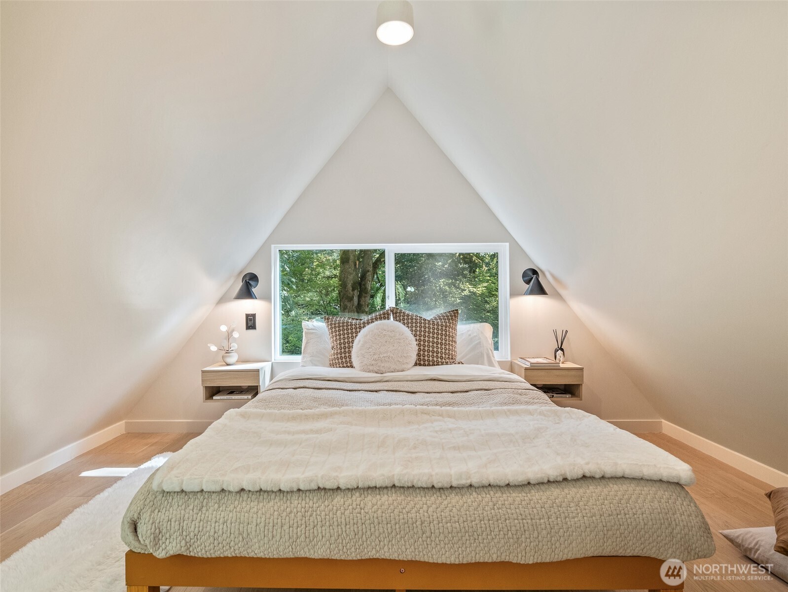 64258 Lookout Mtn Loop Marblemount, WA 98267 - Photo 14 of 40 a bed sitting in a bedroom next to a window