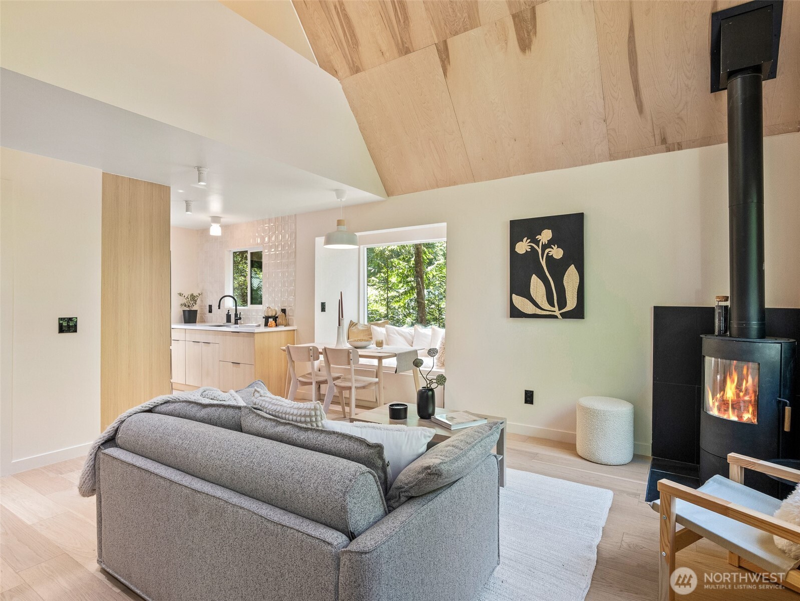 64258 Lookout Mtn Loop Marblemount, WA 98267 - Photo 16 of 40 a living room with furniture and a flat screen tv