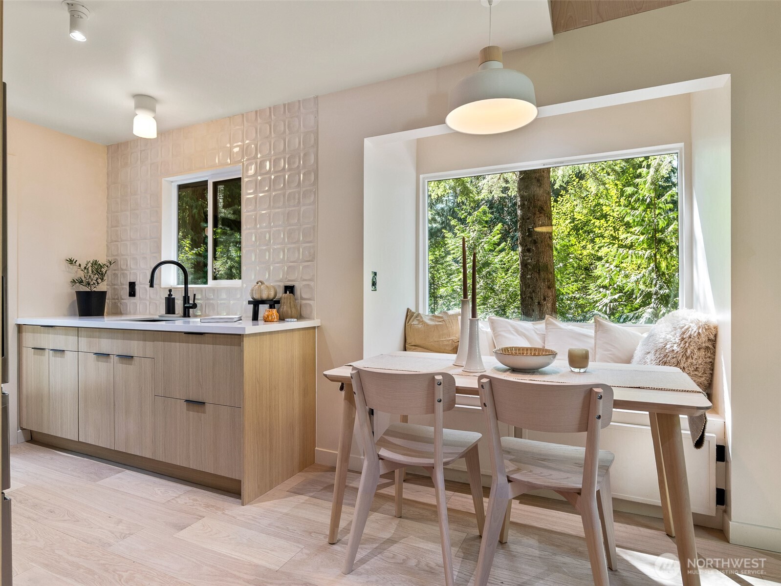 64258 Lookout Mtn Loop Marblemount, WA 98267 - Photo 18 of 40 a kitchen with a table chairs sink and cabinets