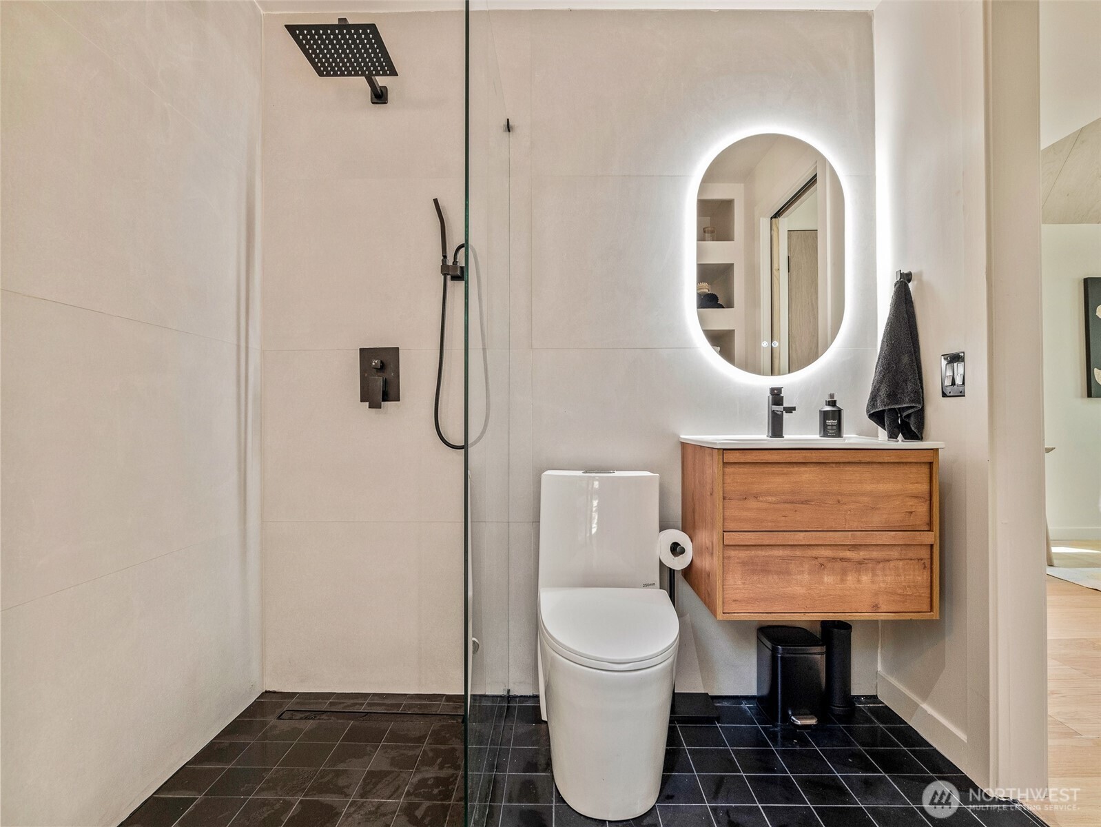 64258 Lookout Mtn Loop Marblemount, WA 98267 - Photo 23 of 40 a bathroom with a toilet a sink and a mirror
