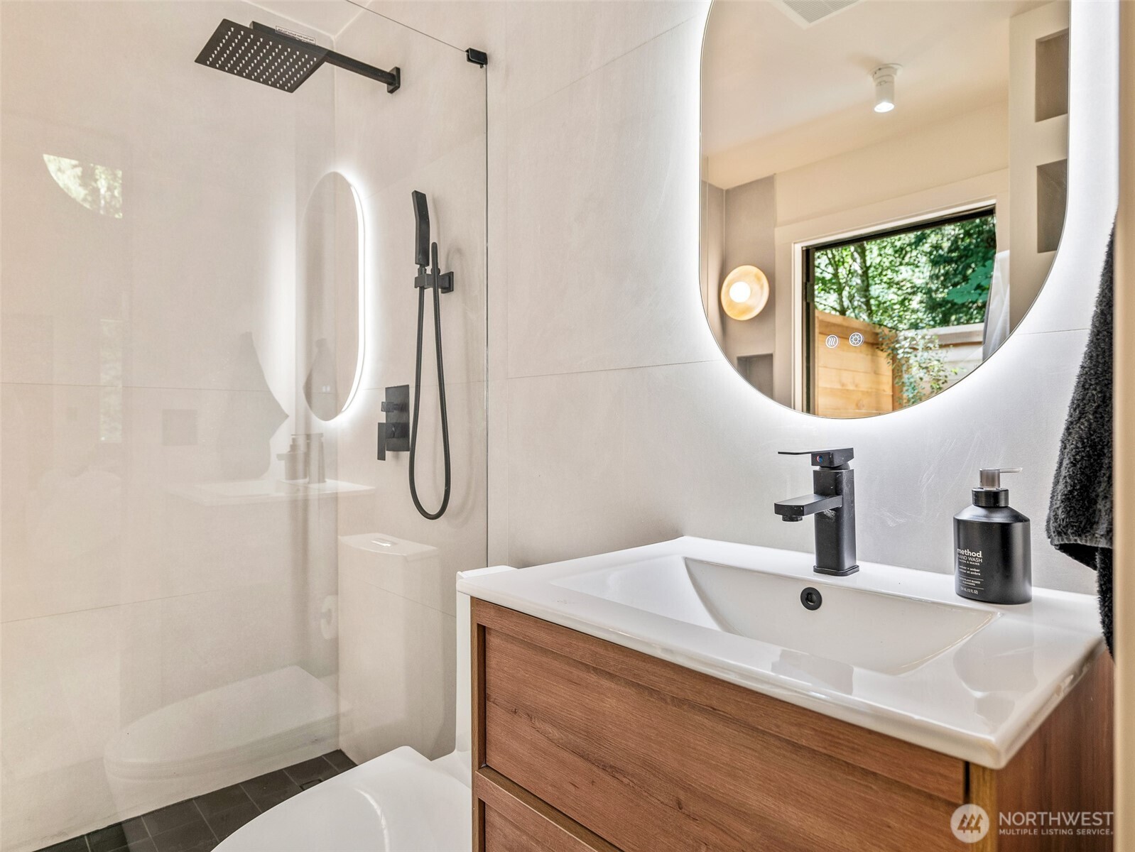 64258 Lookout Mtn Loop Marblemount, WA 98267 - Photo 24 of 40 a bathroom with a sink and a mirror