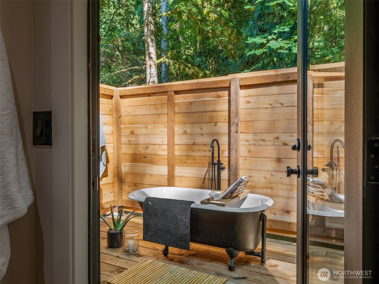 64258 Lookout Mtn Loop Marblemount, WA 98267 - Photo 26 of 40 a view of balcony with a table and chairs