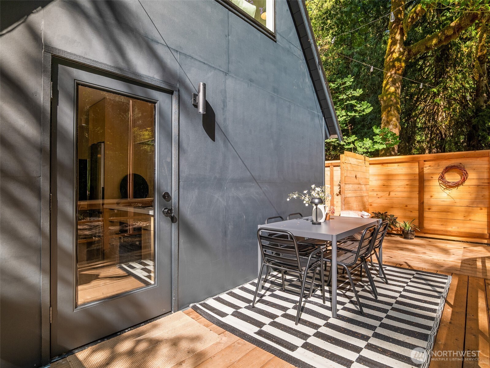 64258 Lookout Mtn Loop Marblemount, WA 98267 - Photo 28 of 40 a view of balcony with wooden floor and outdoor seating