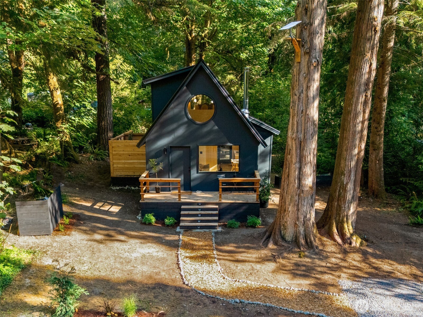 64258 Lookout Mtn Loop Marblemount, WA 98267 - Photo 34 of 40 a front view of a house with garden