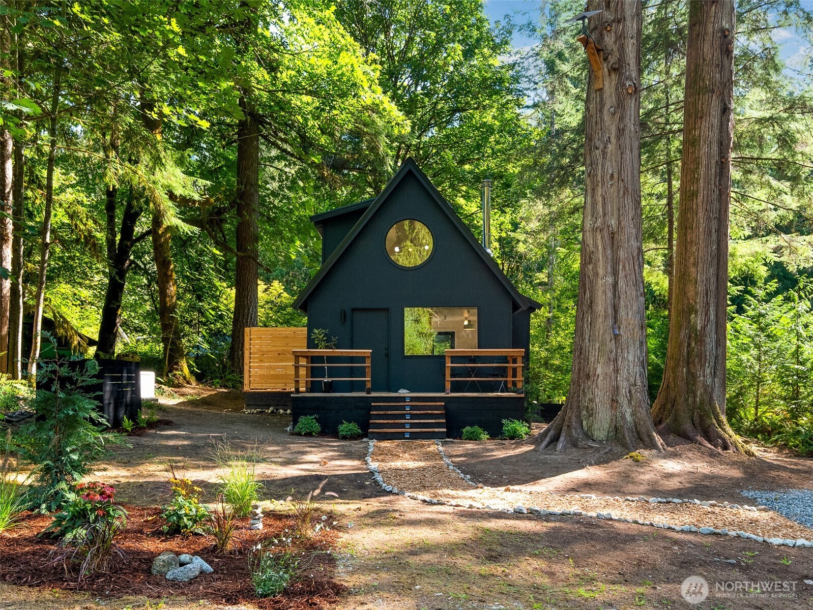 64258 Lookout Mtn Loop Marblemount, WA 98267 - Photo 36 of 40 a front view of a house with a yard