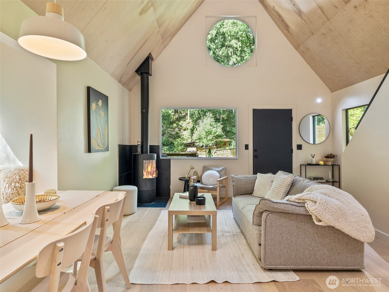 64258 Lookout Mtn Loop Marblemount, WA 98267 - Photo 5 of 40 a living room with furniture and a large window