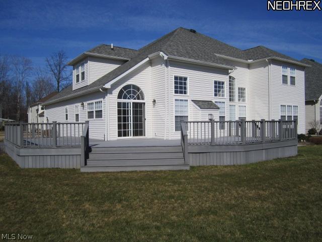180 Burwick Road, Unit A118 Cleveland, OH 44143 - Photo 13 of 14 WOW back of house with wrap around deck. Has 2 sets of stairs and a ramp.